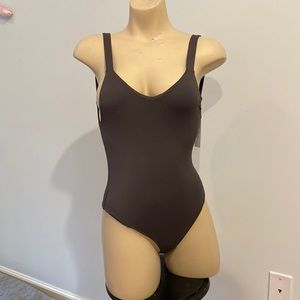 Vitamin A Smokey Gray one piece suit.  Smoke free environment, new with tags.